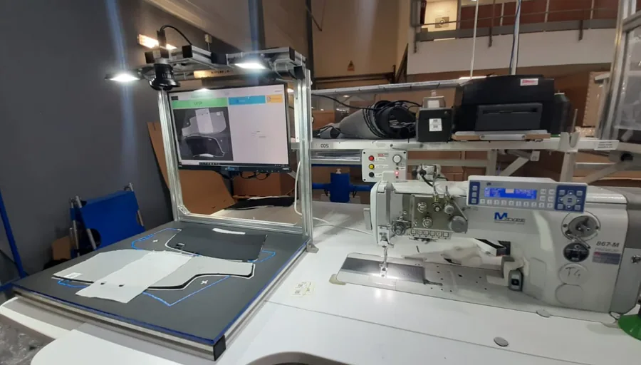 Camera-based control system for automotive headliner fabrics